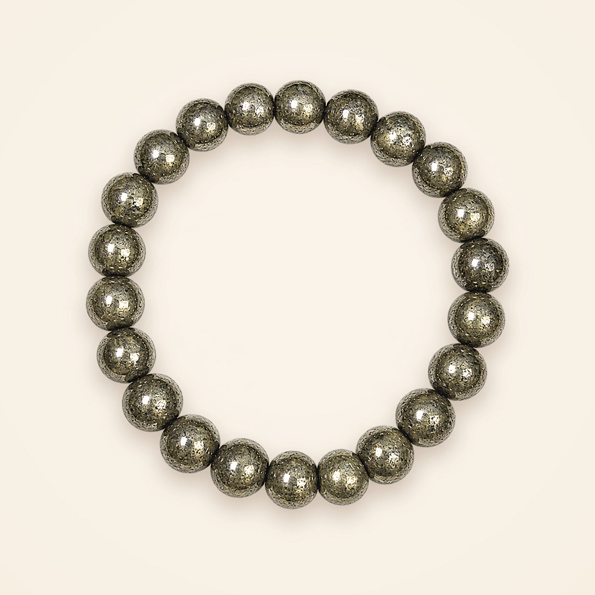 Pyrite Bracelet, top view on an ivory background