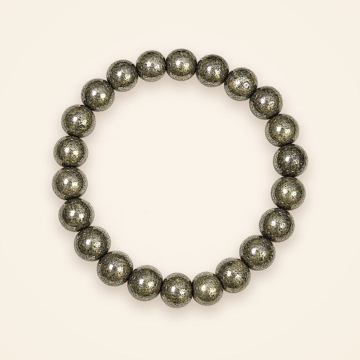 Pyrite Bracelet, top view on an ivory background