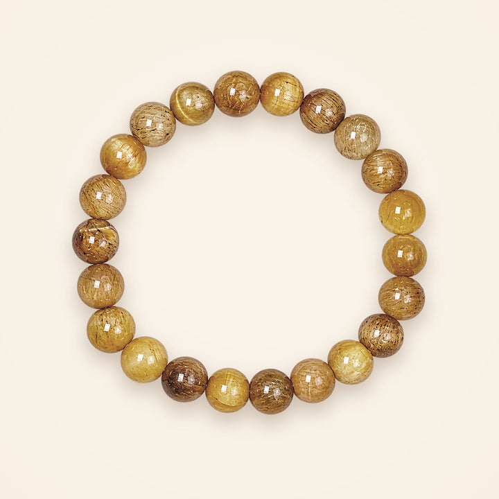 Tiger Eye Bracelet, top view on an ivory background